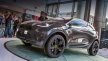 KIA показала рисунки нового гибридного кроссовера